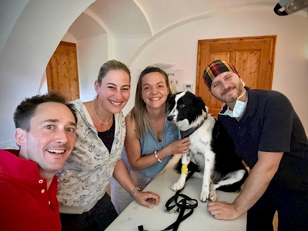 the friendly team of the animal eye clinic treating a dog